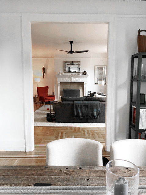 sofa red chair fireplace