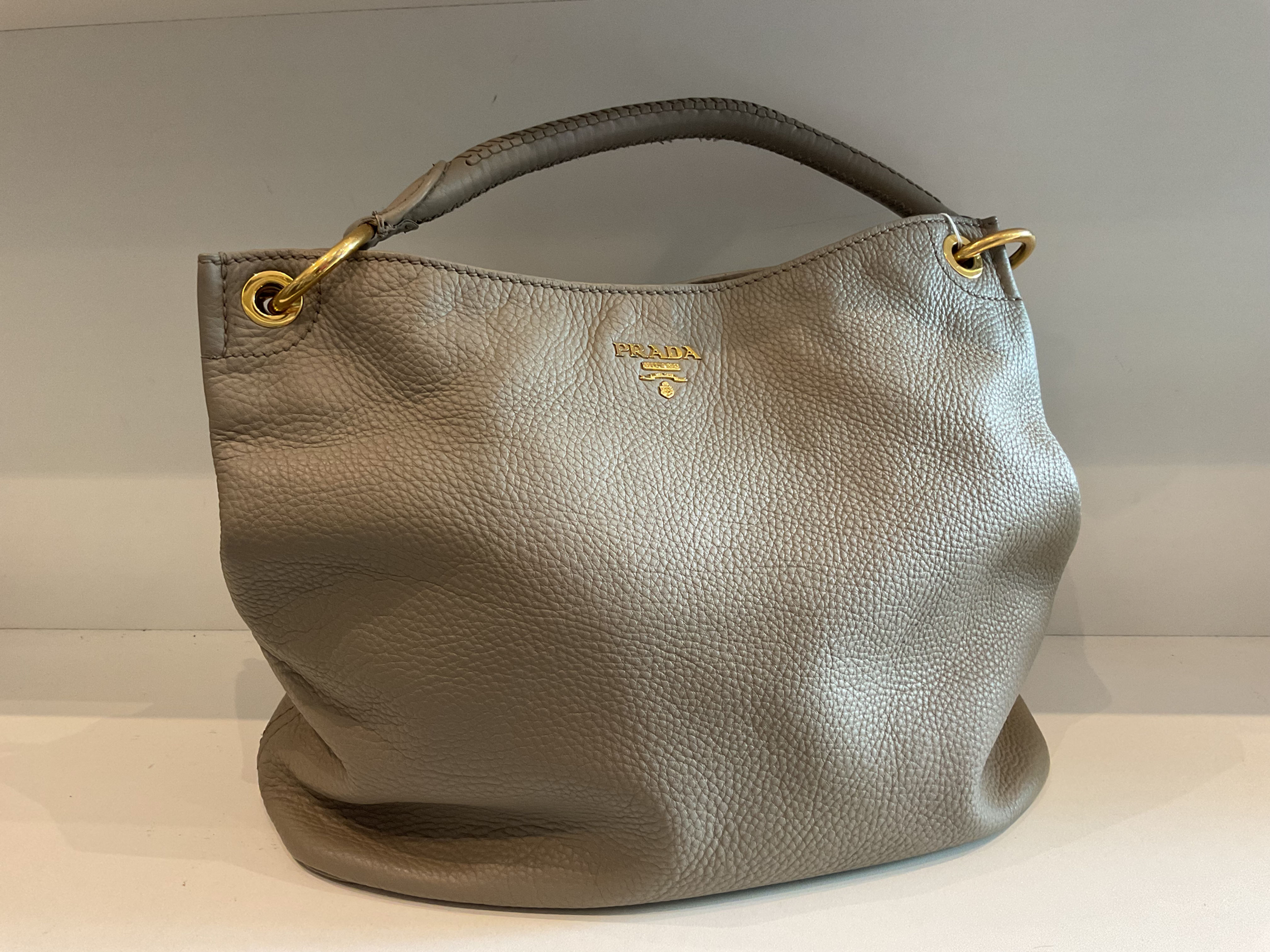 Prada olive green pebbled leather slouch shoulder bag