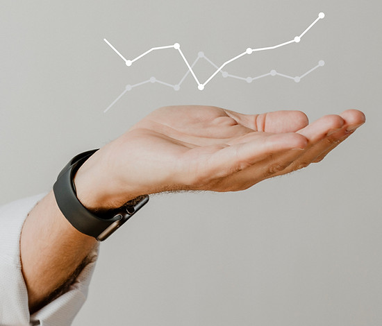 digital-graph-performance-with-businessman-hand-overlay.jpg