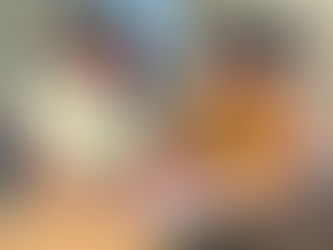 A teacher helping a student at Project Infinity School