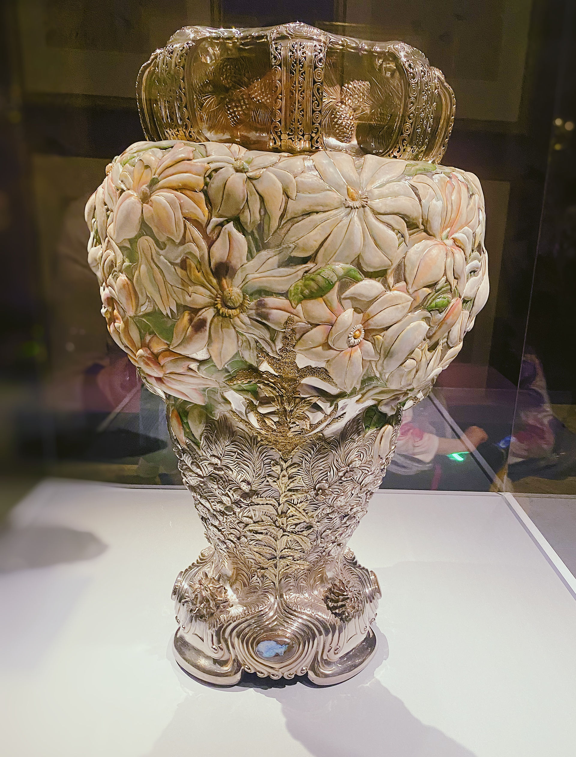 A gorgeous silver vase with enameled magnolias by Tiffany. 