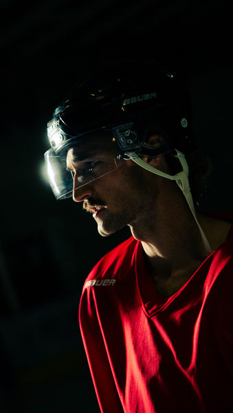 Hockey player looking at the empty rink