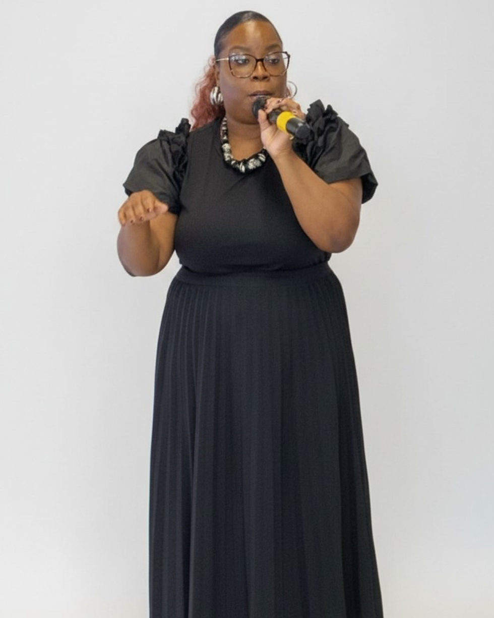 Min. Jones with mic