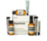 Aesop Departure travel kit sold by Jet Must, with seven skincare essentials in amber tubes and bottles