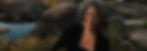 Woman_wearing_black_gazing_deeply_into_the_camera.jpg