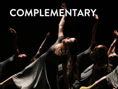 Dancers in gray dresses leaning on the floor with one arm stretched to the ceiling onstage for a dance recital