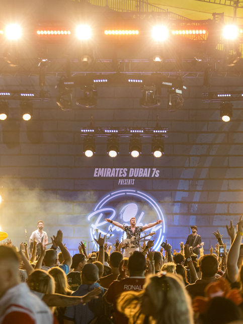 Wide angle shot of massive concert crowd at Dubai festival