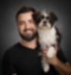 Portrait image of Alin Constantin and his dog Bruce