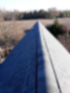An image of a roof in the winter to showcase roof ventilation