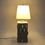 Thumbnail: Building with Blue Interior Lamp