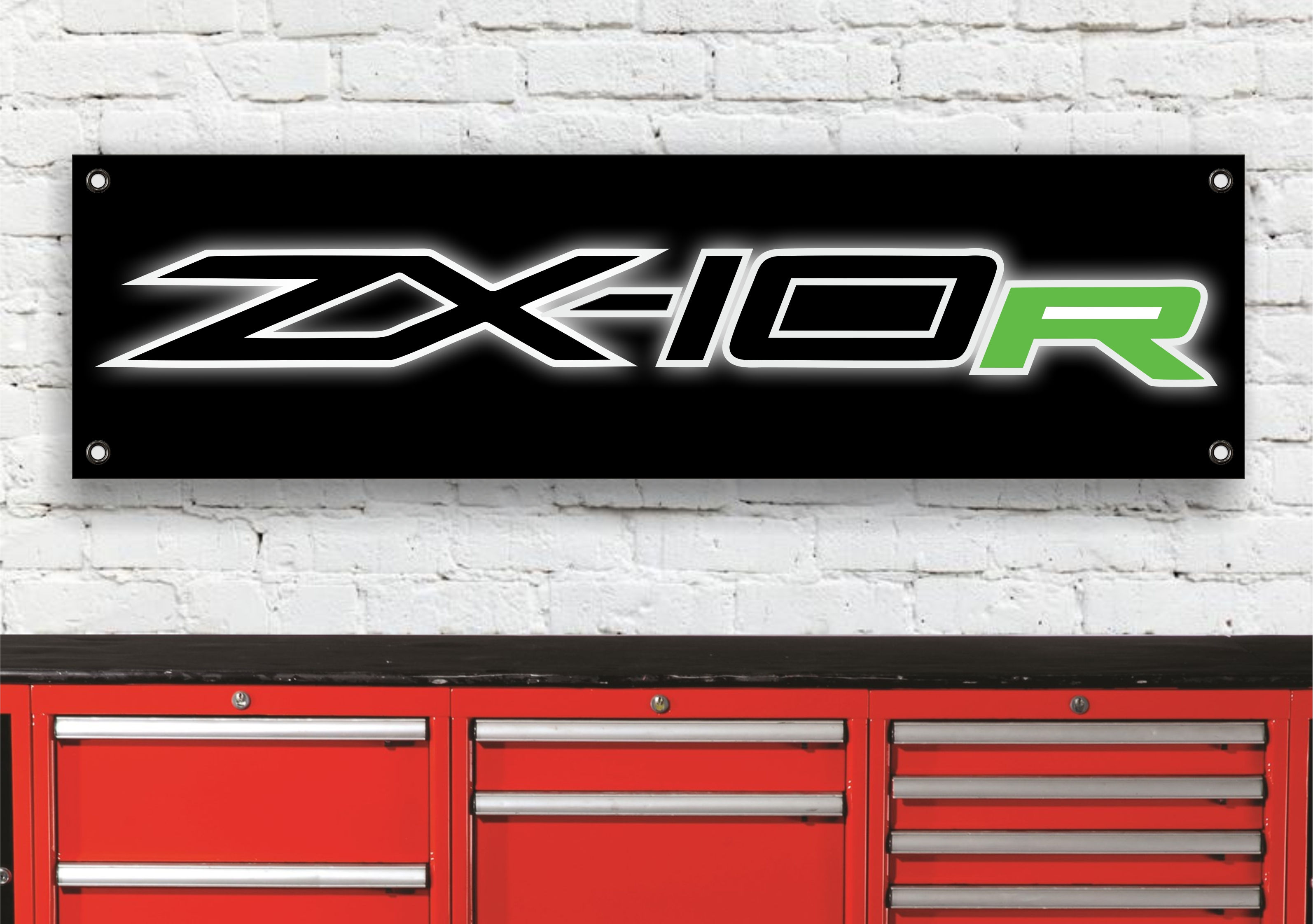 Black banner with the ZX-10R LOGO over a red tool cabinet.
