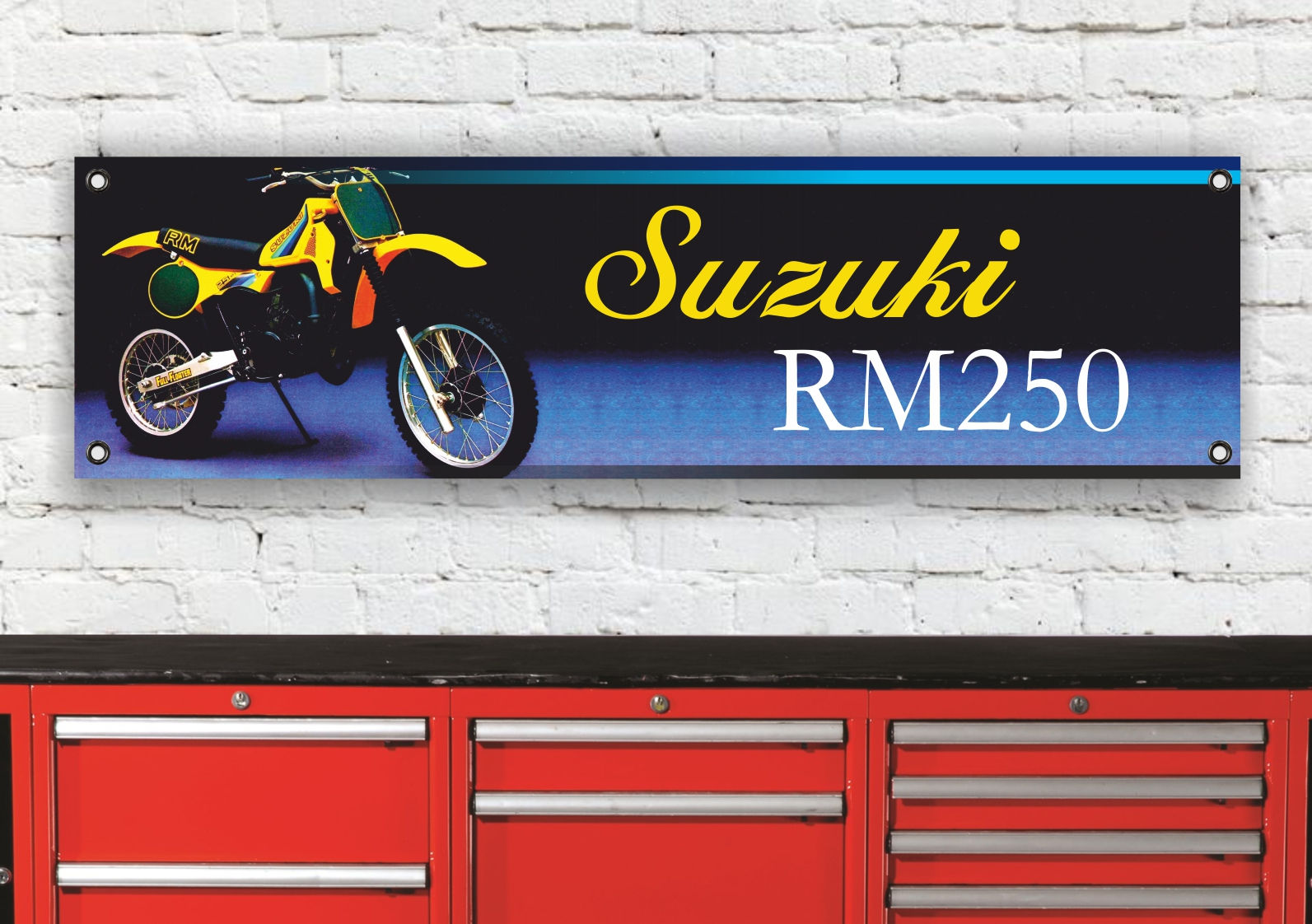 Suzuki RM250 motorcycle advertisement with a yellow and black bike on display.