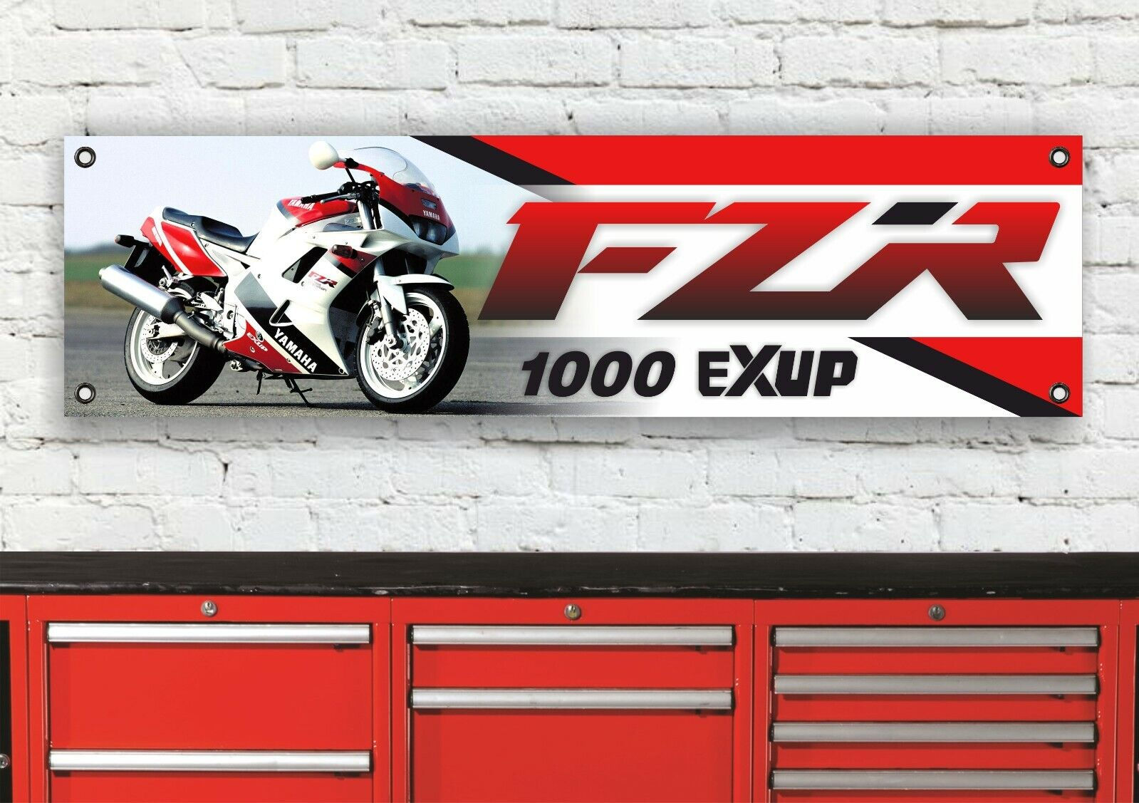 Motorcycle banner with FZR 1000 EXUP on a red and white wall background.