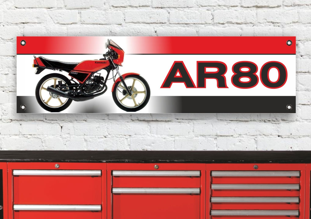 Red AR80 motorcycle sign, text "AR80" and motorcycle picture. AR80 RED, displayed on brick wall.