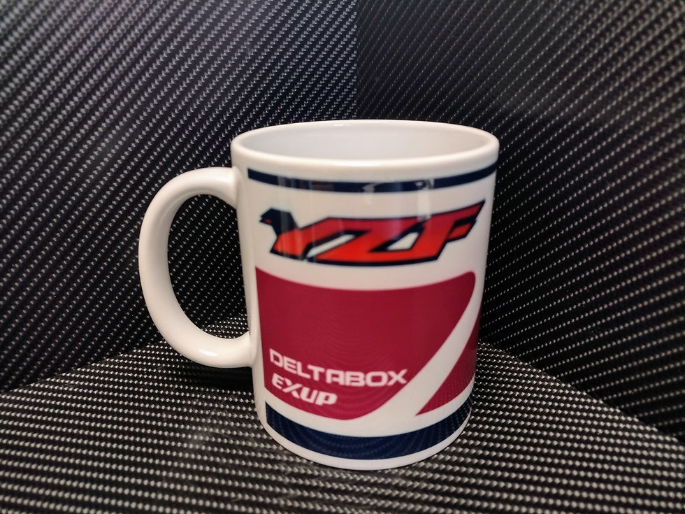 White mug with "YZF" logo and "DELTABOX EXUP" text on the side.