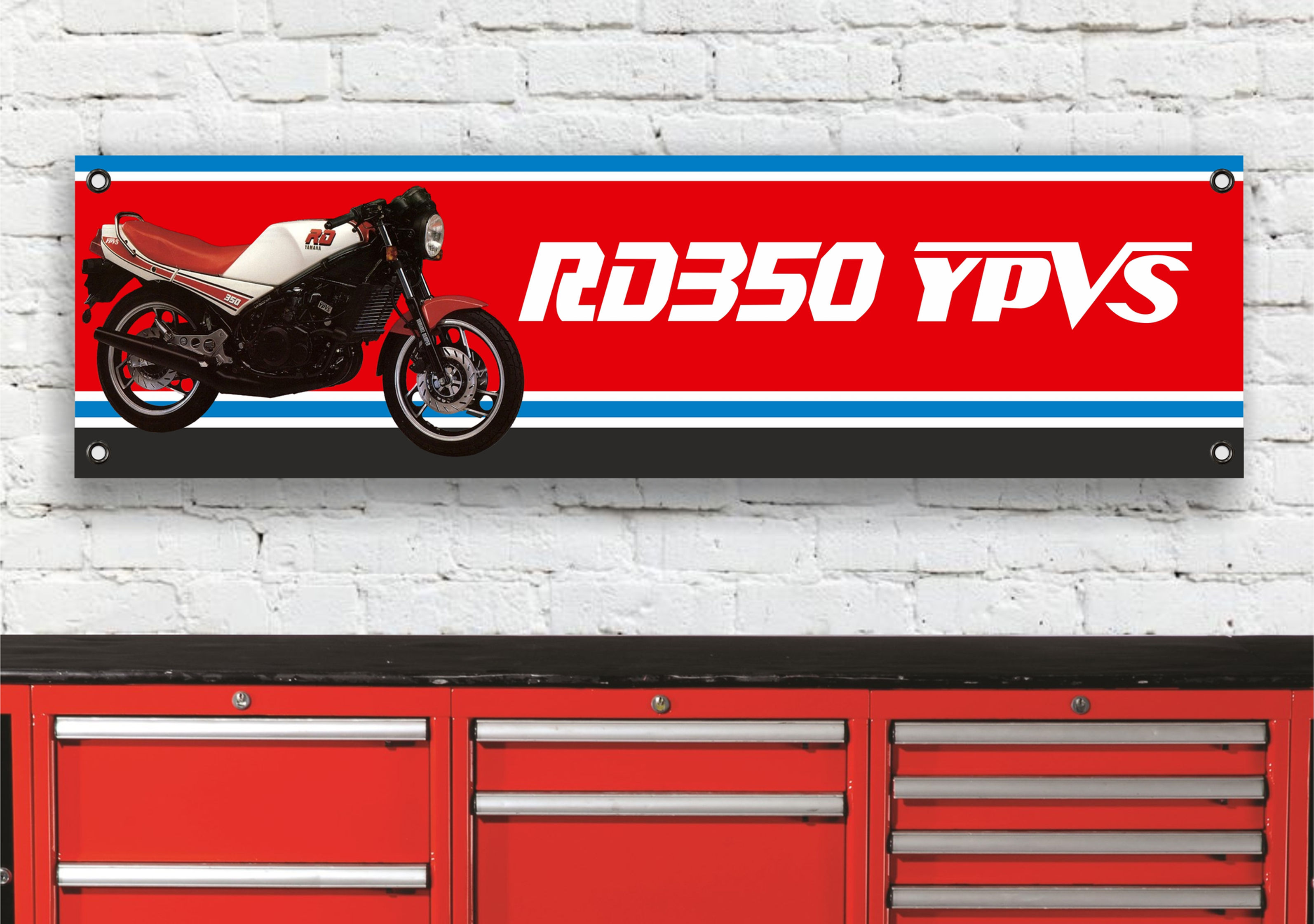 RD350 YPVS banner displayed with motorcycle and text against brick wall RD350 YPVS 31K.
