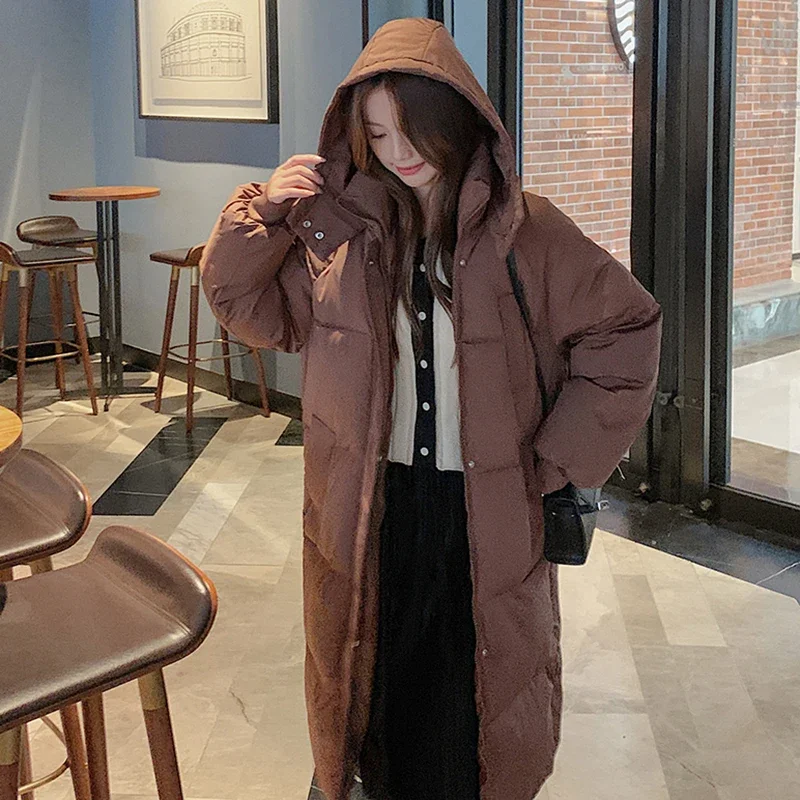 Thumbnail: Women's Button Down Puffer Coat with pockets.