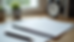 Eye-level view of a neatly organized workspace with a planner and clock