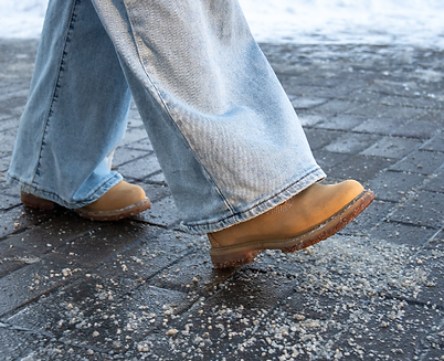 deicing sidewalks and driveways Michigan snow removal
