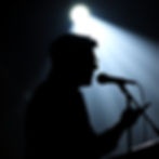 silhouette of a person public speaking.jpg