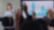 opening-floor-qa-session-rearview-shot-group-businesspeople-raising-their-hands-during-con