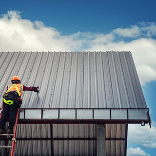 worker-man-building-tradesman-roof-house-with-safety-helmet.jpg