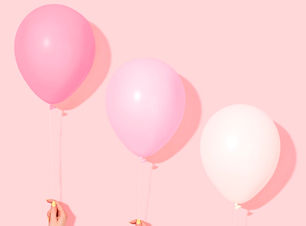 Hands Holding Balloons