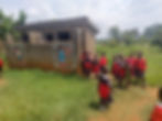 The exterior of the existing latrine block at Magooli School, pictured in January 2024.