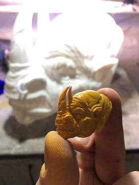 A high-detail 3D printed rhinoceros head sculpture showcasing intricate textures and realistic anatomy, created as part of custom art projects by Art of Arm in Toronto.