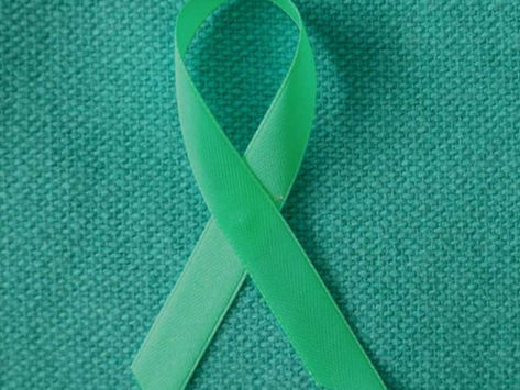 "Murray Hall Community Trust Stands Strong with Green Ribbons for Mental Health Awareness Week"