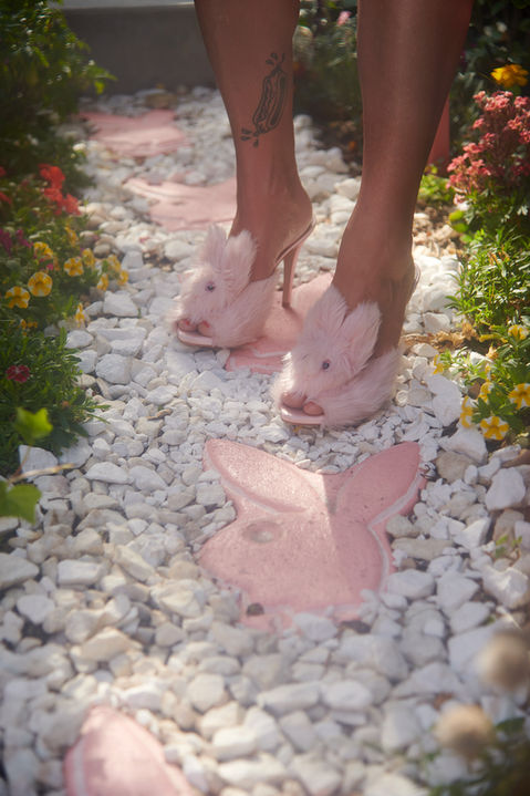 bunny-slippers-fuzzy-playboy-flagstones-garden.jpg