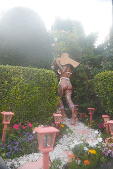 woman-garden-path-sun-hat-lingerie.jpg