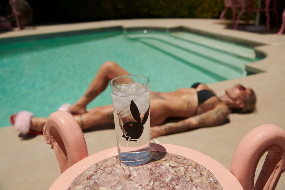 woman-lounging-poolside-drink-playboy-vintage-70s-80s-fashion-editorials.jpg