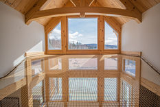 filet mezzanine sur mesure installé dans un chalet contemporain des Laurentides par le spécialiste des filets d'habitation au Québec