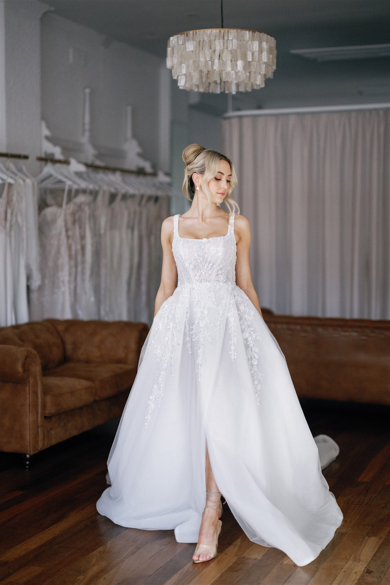 front view of the Charlie-Rose Beaded Gown showing floral embroidery on the bodice and square neckline detail.