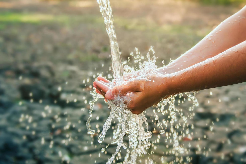 Water spilling into hands