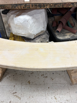 This is the nearly-complete bench, both legs attached to the seat and upright.