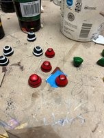 Painted clay game pieces.