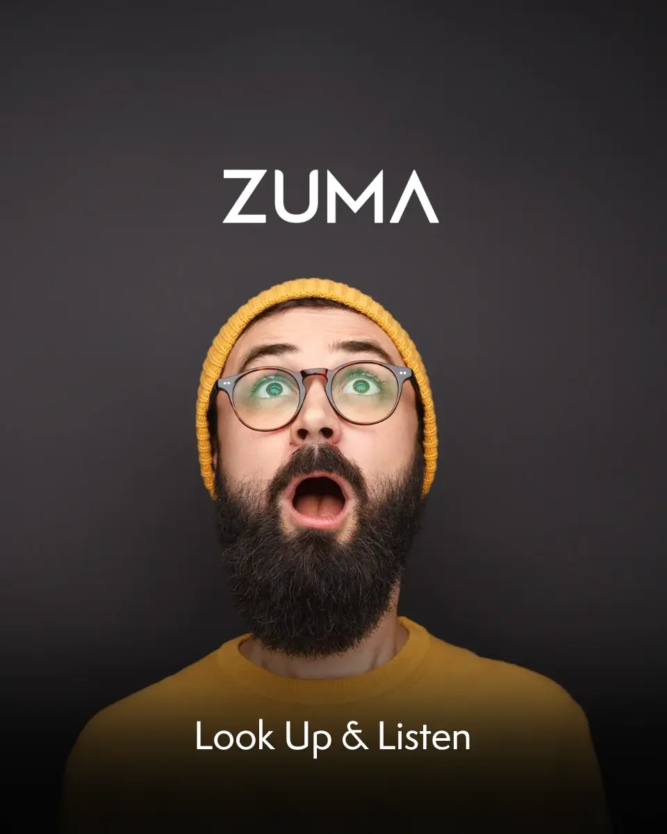 Bearded man reacting to Zuma – Bearded man wearing glasses and a yellow beanie looking surprised under the Zuma brand logo.