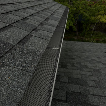 Absolutely! Here’s a fresh take on the SEO-optimized long description for your roofing and gutter photos:
This recent project highlights our comprehensive roofing and gutter services, where we revitalized a suburban home with a full roof replacement and state-of-the-art gutter system. Our expert team installed high-grade asphalt shingles, elevating the home’s appearance while ensuring robust protection against the elements. This new roofing solution not only enhances curb appeal but also provides homeowners with confidence in its durability and long-lasting performance.
In addition to the roof, we upgraded the home’s drainage capabilities with seamless gutters that effectively direct rainwater away from the foundation. This installation is essential for preventing water damage and safeguarding the home’s structural integrity. Our seamless gutters are custom-fitted to enhance both functionality and aesthetics, ensuring that they blend seamlessly with the home’s design.
By prioritizing exceptional quality and customer service, we are committed to delivering tailored roofing and gutter solutions that meet the unique needs of each homeowner. This project is a testament to our dedication to enhancing the safety and beauty of residential properties. Whether you’re looking for a reliable roof replacement or a functional gutter system, our experienced team is here to provide top-notch services that stand the test of time.