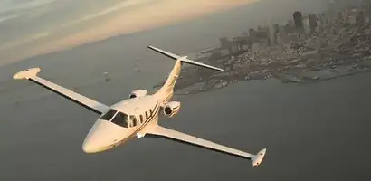 White private jet flying