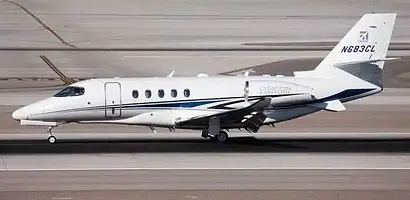 White private jet with tail number N830CC