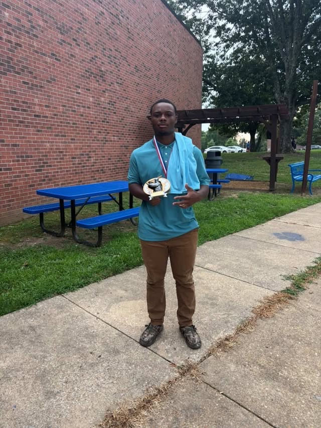 3 star baseball athlete Mason Bouldin takes a picture holding his MVP Trophy he recently won as he’s leaving the Baseball All-Star Awards at Rust College.