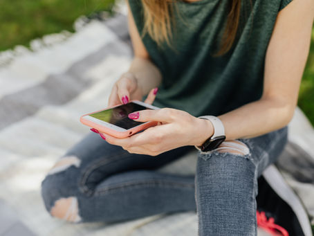 woman scrolling phone