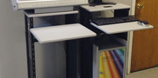 Two mobile workstation carts with displays on top