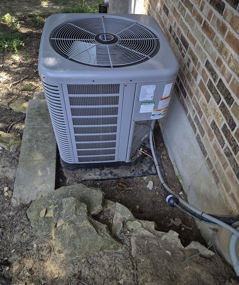 Photo: an outdoor air conditioner condenser unit at a Missouri home.