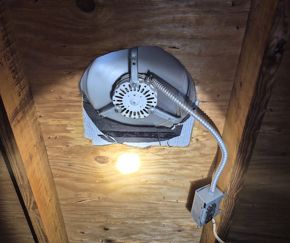 Field Photo: This is what a thermostatically controlled fan look like, installed in an attic system. Picture taken during a thermal imaging inspection, during the attic inspection.
