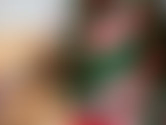 christmas stocking with presents and bear and tree in background