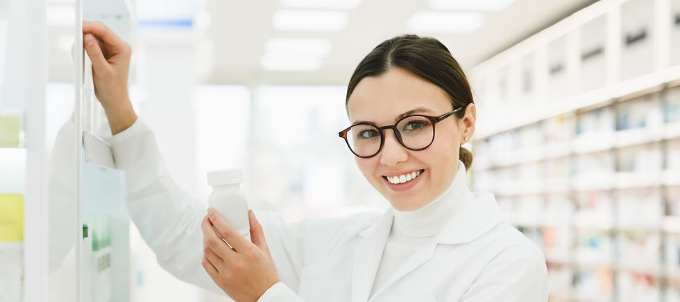 druggist-in-white-medical-coat-holding-remedy-pill-2023-11-27-05-27-22-utc V2.jpg