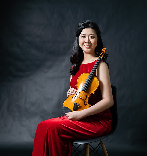 Elegant violinist in a beautiful setting